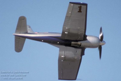 911562 F4U Super Corsair N31518 right side in flight l.jpg